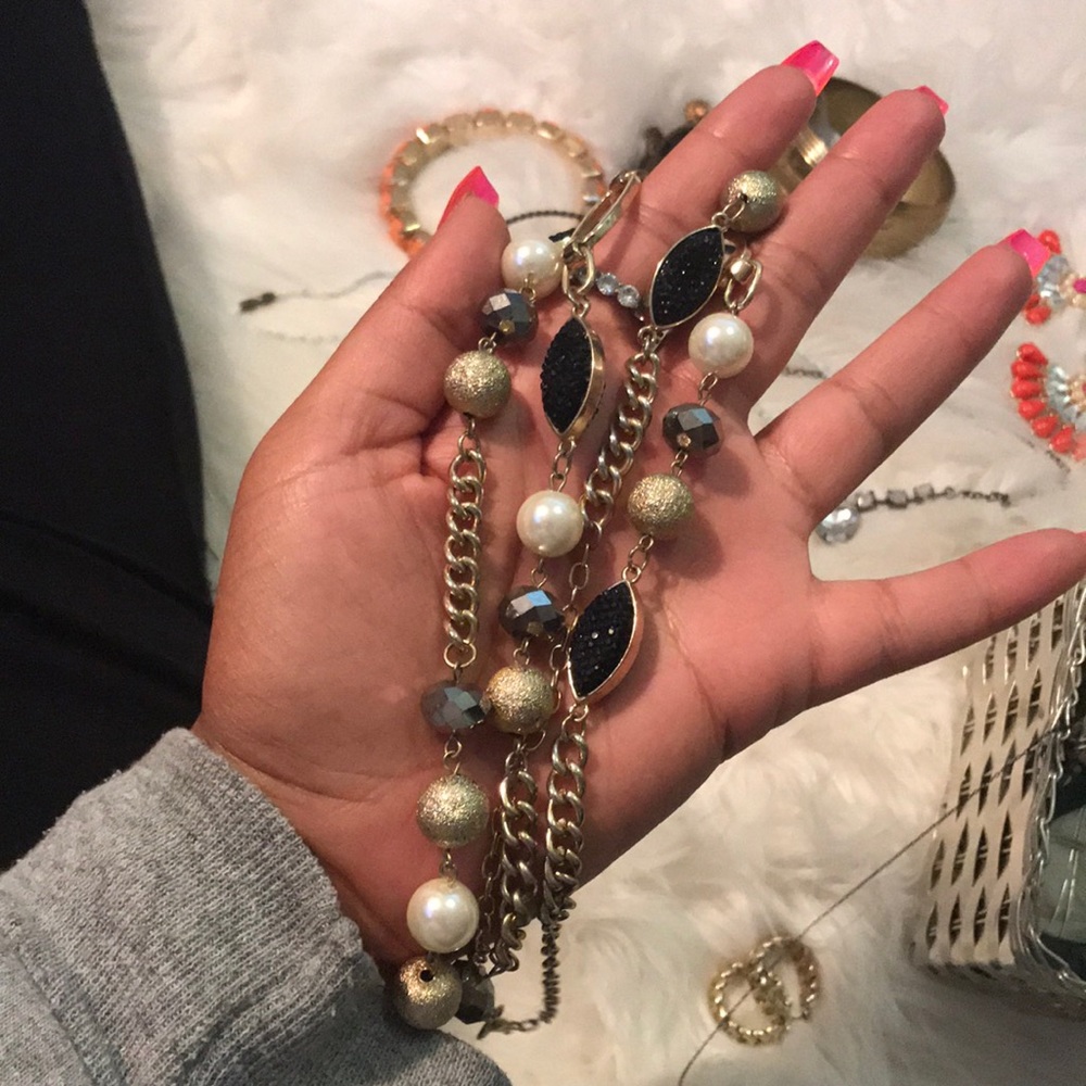 Gold black and silver necklace